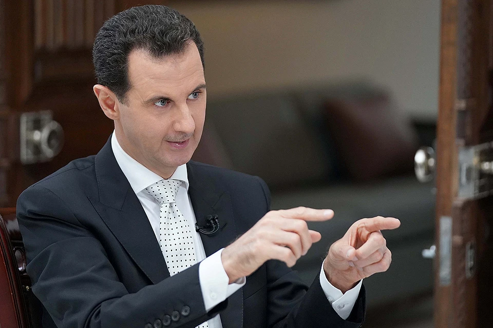 Башар Асад во время интервью греческой газете Kathimerini.