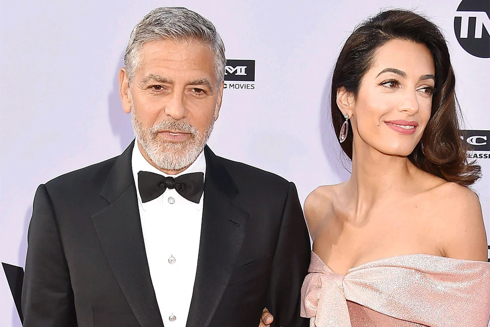 Актер Джордж Клуни с супругой Амаль.