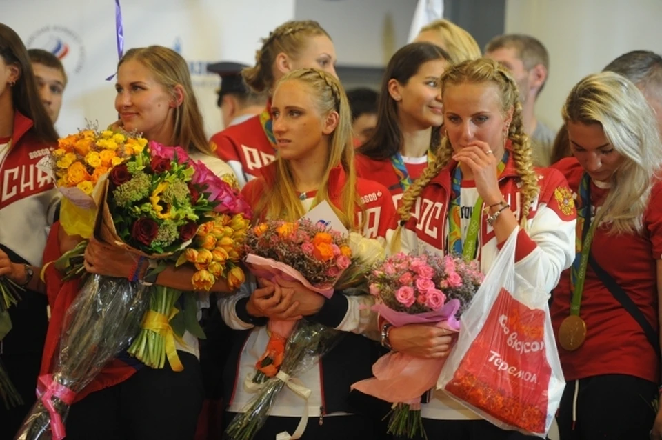 Влада (в центре) несколько лет назад уже стала Олимпийской чемпионкой.