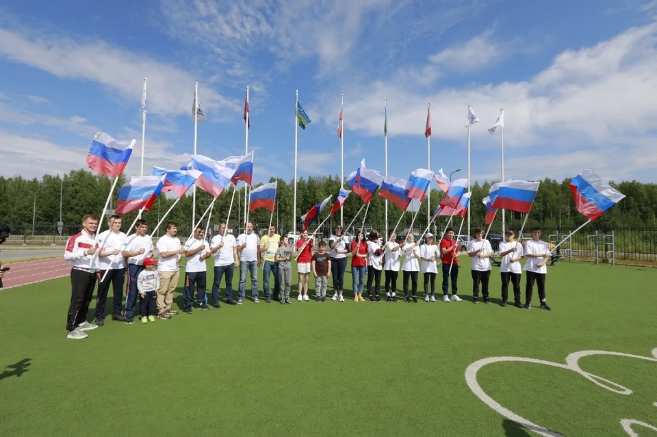 В Ханты-Мансийске провели акцию в поддержку югорской команды на Олимпийских играх в Токио Фото: Городской информационный центр