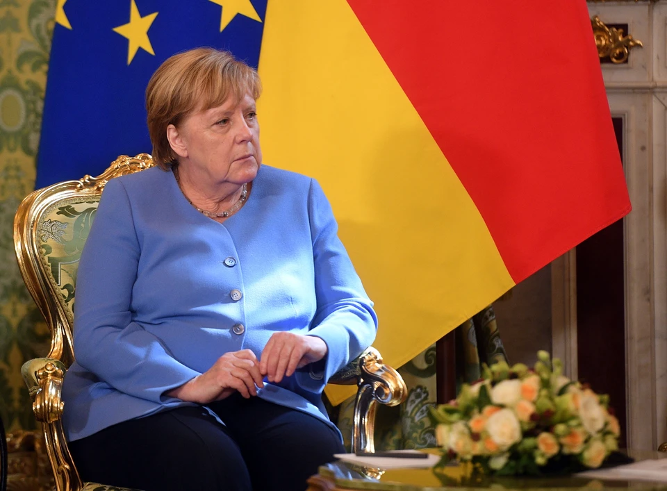 Ангела Меркель во время переговоров с президентом Путиным в Кремле.