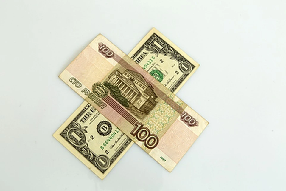 Курс доллара на Мосбирже упал ниже 66 рублей впервые с марта 2020 года