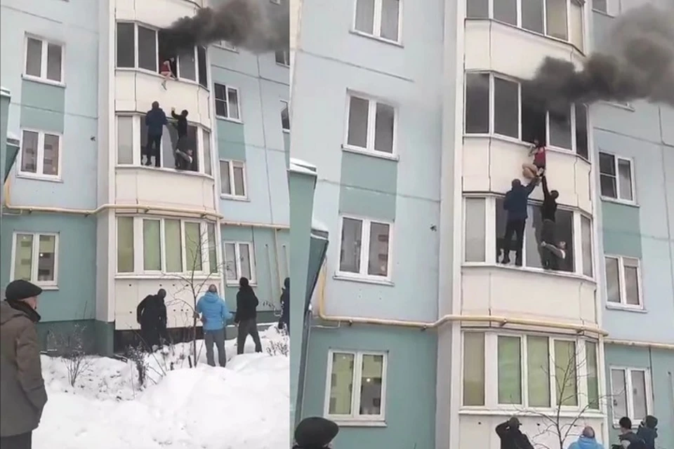 С балкона горящей квартиры в Ярославле сняли девушку. Скриншот с видео, группа "Жесть Ярославль" ВКонтакте