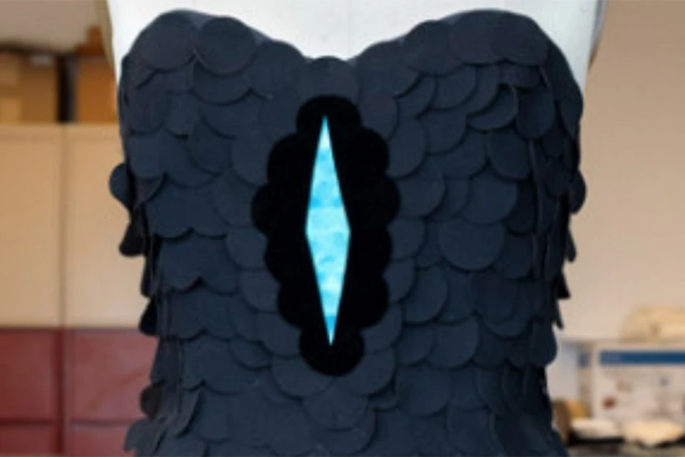 Из самой черной ткани уже сшили платье.