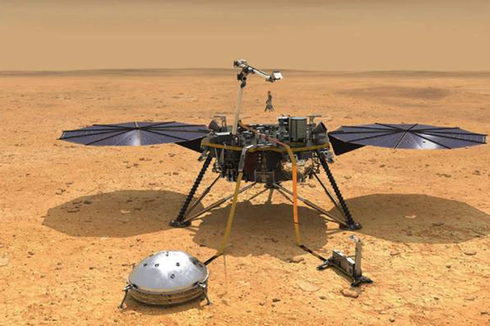 InSight с выставленным рядом с собой сейсмографом