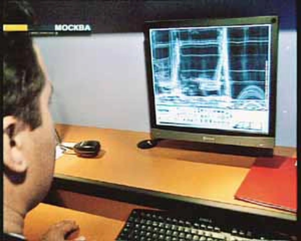 На мониторе видно все,  что лежит в контейнере груженной доверху фуры.