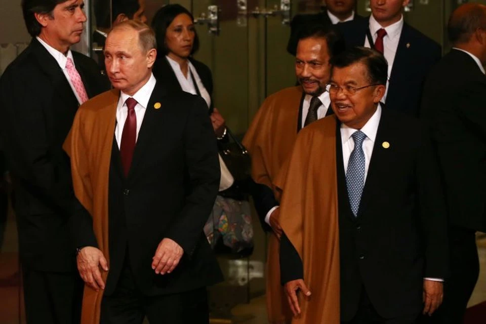 Президент РФ Владимир Путин принял участие в традиционной церемонии фотографирования на саммите АТЭС